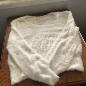 white fuzzy sweater